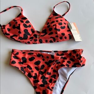 NWT Orange and Black Leopard Print Bikini
Size Medium